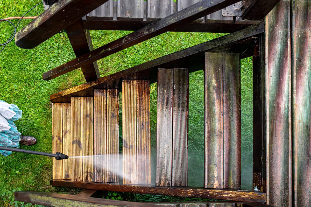 Clean wooden decking after pressure washing